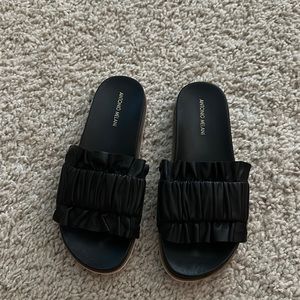 Antonio Melani slides